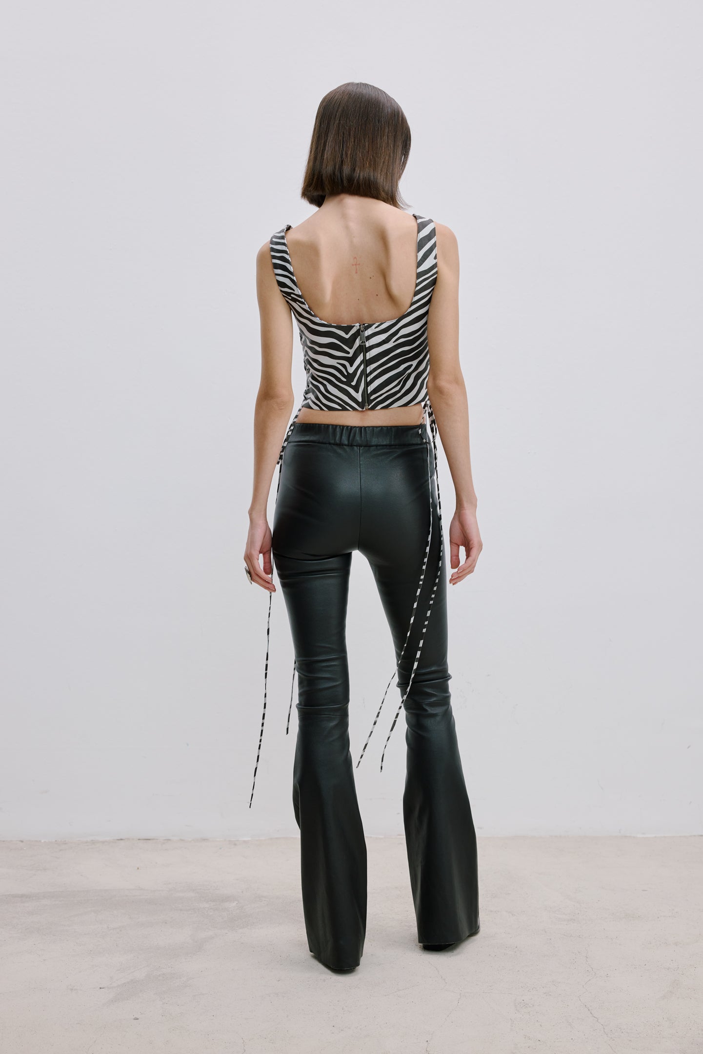 LACE-UP DETAILED LEATHER TOP