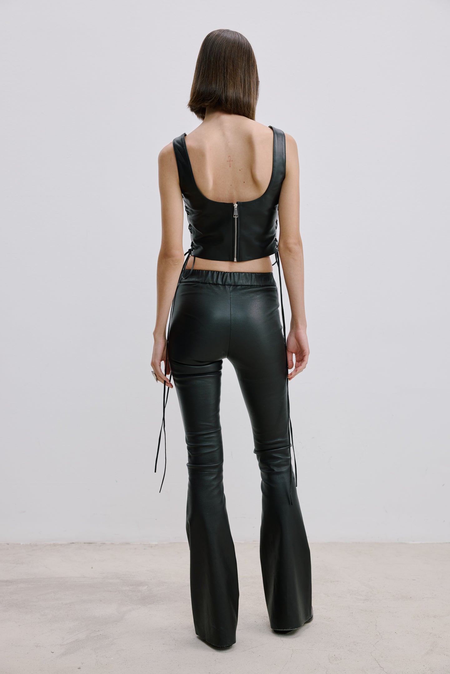 LACE-UP DETAILED LEATHER TOP